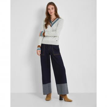 Pantalón ancho de mujer con contrate en el bajo y detalles de desgaste