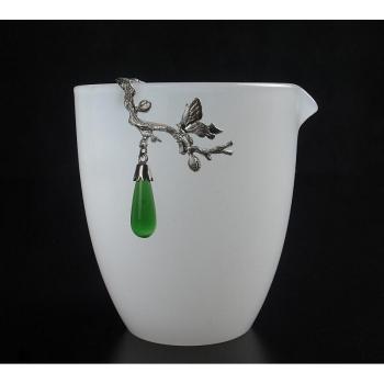 White Jade-Inlaid Porcelain Tea Cup with Large Handle and Clear Body