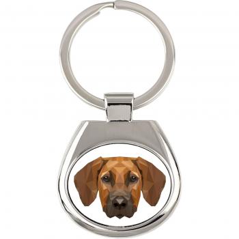 Ridgeback & Lion Dog – Geometrischer Schlüsselanhänger mit Löwenportrait und Art‑Dog‑Aufschrift