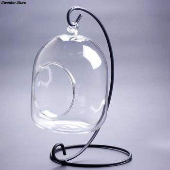 Bougeoir en métal avec globe en verre