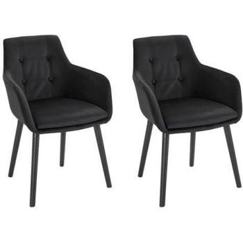 Chaises tapissées en velours noir
