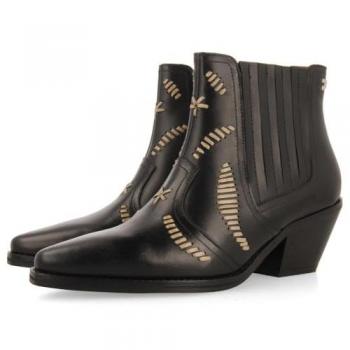 Botines de piel bordados estilo cowboy para mujer