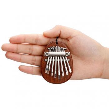 Piano de pulgar compacto