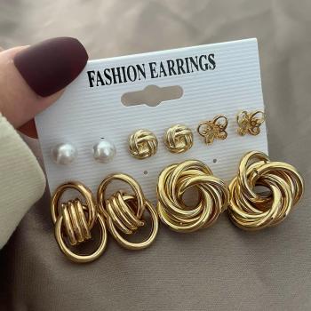 Joyas de mujer: pendientes giratorios rosas