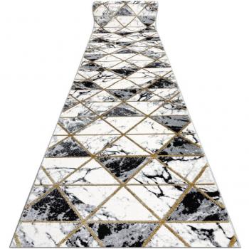Elegancia Negra y Dorada Alfombra