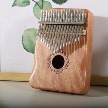 Musikalisches Kalimba-Instrument mit 17 Tasten und Lernbuch