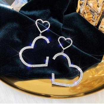 Pendientes elegantes de cadena larga para mujer en dorado y plateado