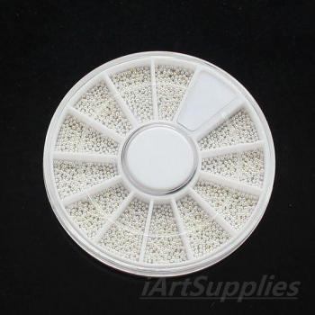 Ruedita Perla Caviar – 1mm, Oro y Plata