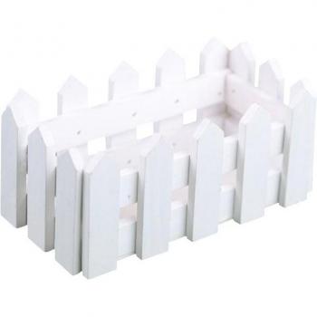 Pot de fleurs avec clôture en bois blanc