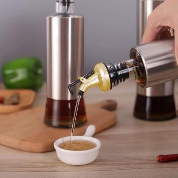 Dispensador de botellas de aceite con pulverizador