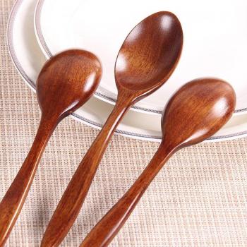 Cuillère en bois pour mélanger le miel