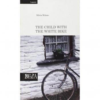 The child with the white bike