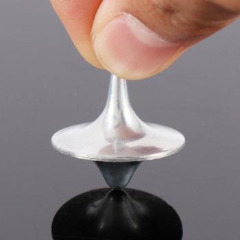 Precision Silver Spinning Top