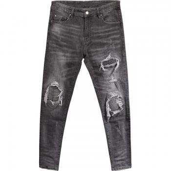 Pantalón vaquero rasgado “Estilo Urbano Entallado”