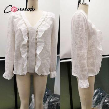 Blusa de encaje con mangas largas abullonadas