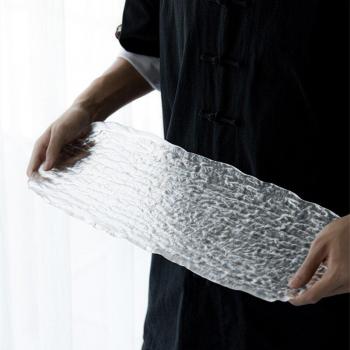 Tablette translucide pour théière