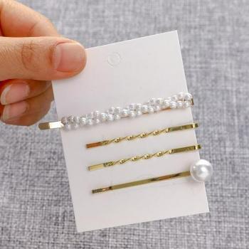 Set de pinzas para el pelo con perlas