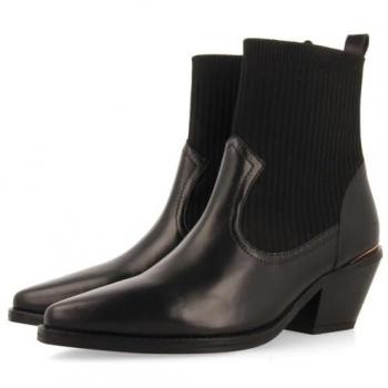 Botines cowboy tipo calcetín tacón piel tapolca