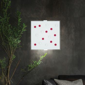 Elegante Wandlampe mit warmweißem Licht und Glasakzenten