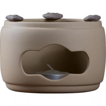 Base thermique pour théière