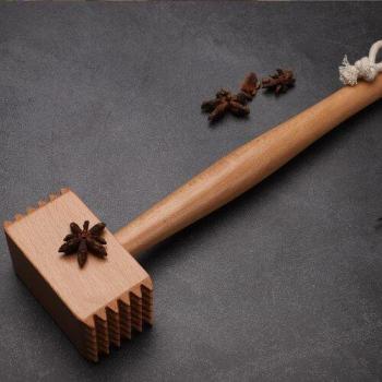 Outil de tendreté en bois