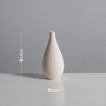 Florero blanco para sala de estar