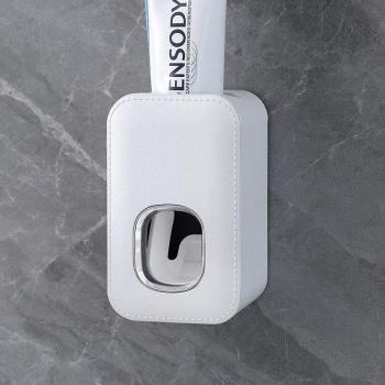 Support mural pour dentifrice pratique