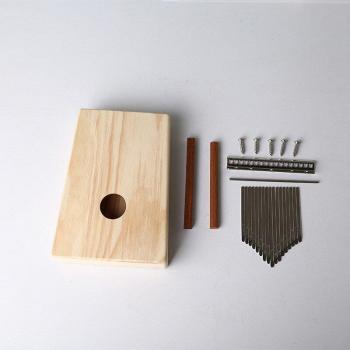 Pulgar-Piano de Madera