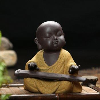 Ornements de thé en sable violet