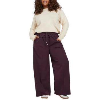 Pantalon en tissu tissé rouge, à la forme curve, fermeture pull‑on, coutures frontales