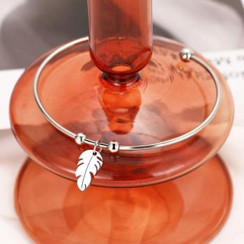 CACANA Schicke Armbinde mit Federdesign