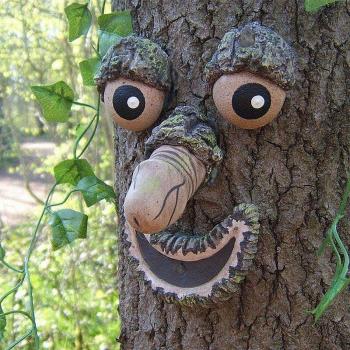 Art de jardin visage de vieil homme