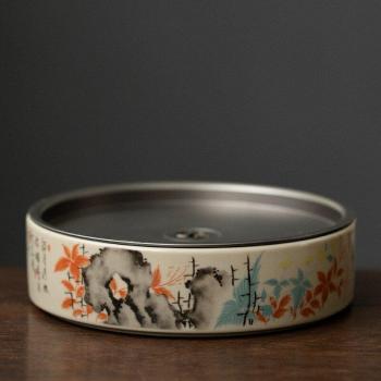 Mesa de té seca contraída