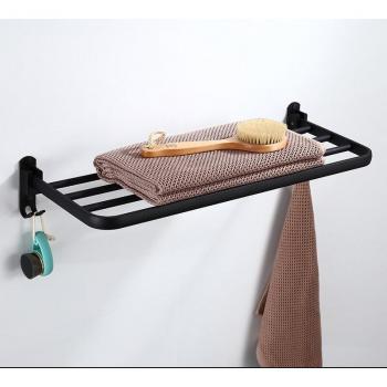 Estante de baño plegable con toallero