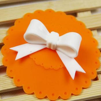 Capuchon silicone à nœud papillon pour tasse