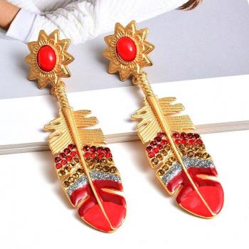 Boucle d'oreille étendue en métal huilé à cristaux vibrants