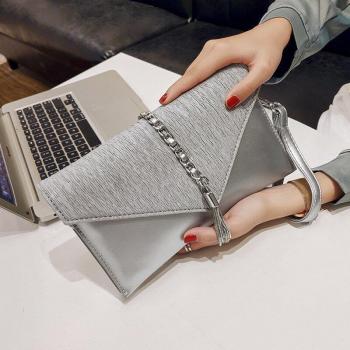 XMESSUN Travel-Friendly Tassel Messenger Bag