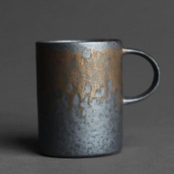 Traditional Japanese Blackened Pottery Tea Cup with Gold Handle
