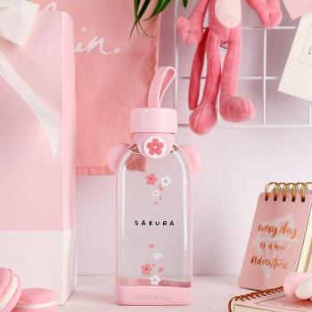 Cadeau voor meisjes: transparante glazen waterfles met kersenbloesem motief