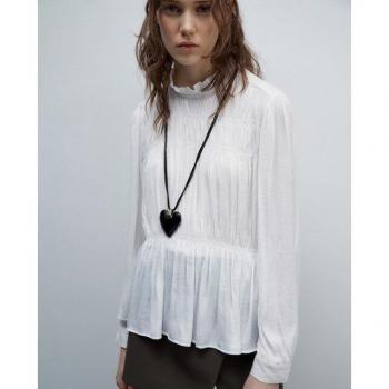 Blusa Sfera de tejido fluido