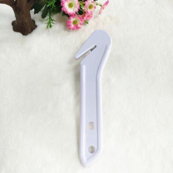 Coupe-papier en plastique pour emballage cadeau