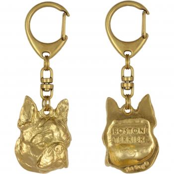 Porte-clés doré avec chien