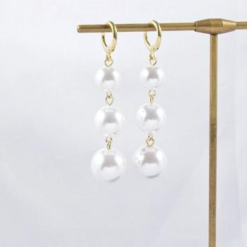 Pendientes elegantes de perlas de imitación