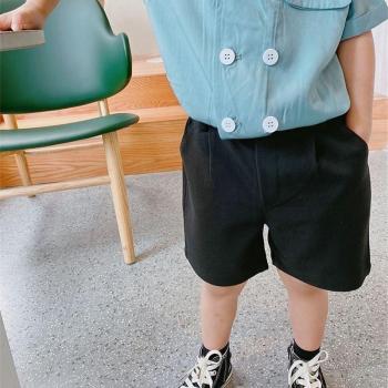 Pantalones cortos con botón y bolsillo para bebé