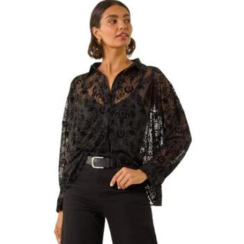 Veste légère noire aux détails floraux texturés et col profond