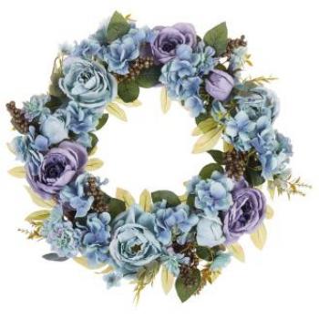 Porte d’entrée embellie : couronne botanique bois et fleurs bleues