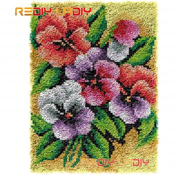 Couture de tapis de sol tricoté