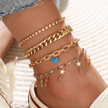 Joyero Bohemio en Oro: Tobillera con Corazón y Mariposa