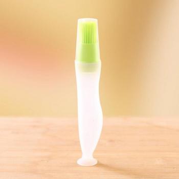 Bouteille d'huile avec couvercle et brosse