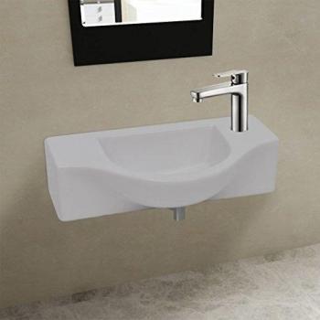 Lavabo de cerámica blanco con espacio para grifo